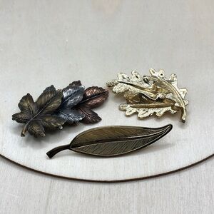 Curated bundle 3 vintage leafy leaf brooches variety.